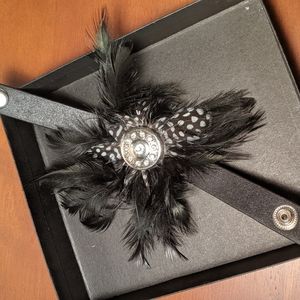Black and white leather and feather unique bracele
